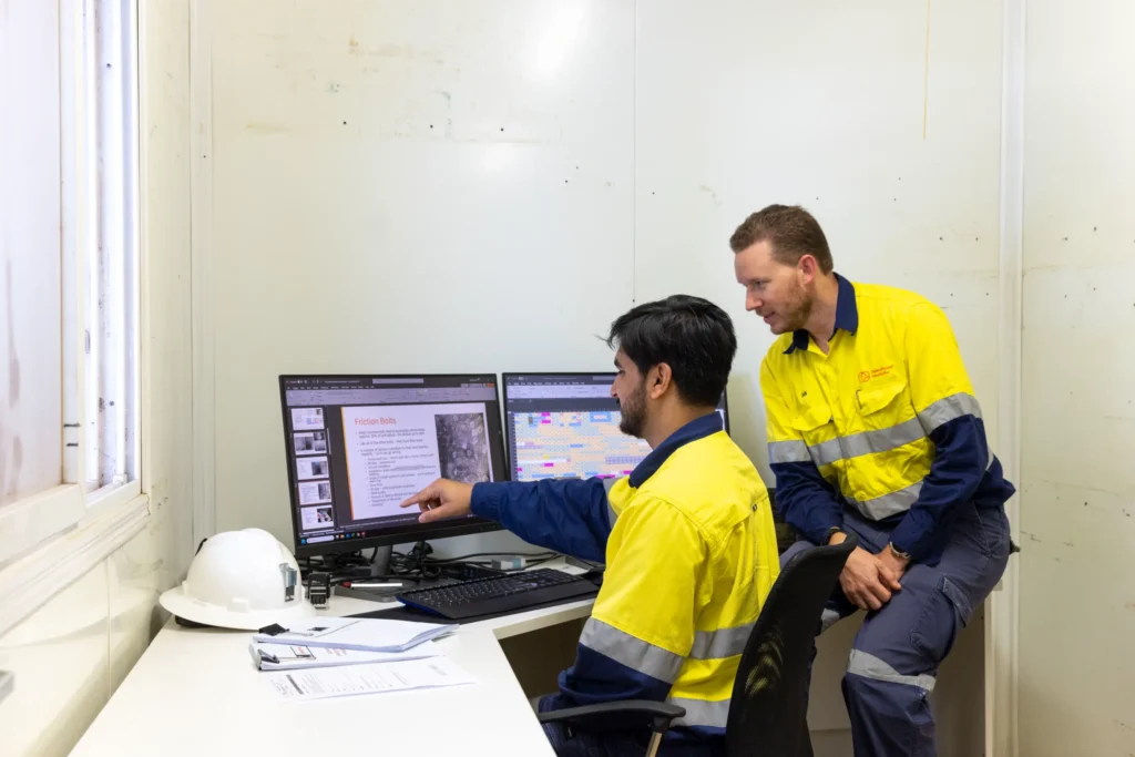 Operational Geotechs staff having a conversation